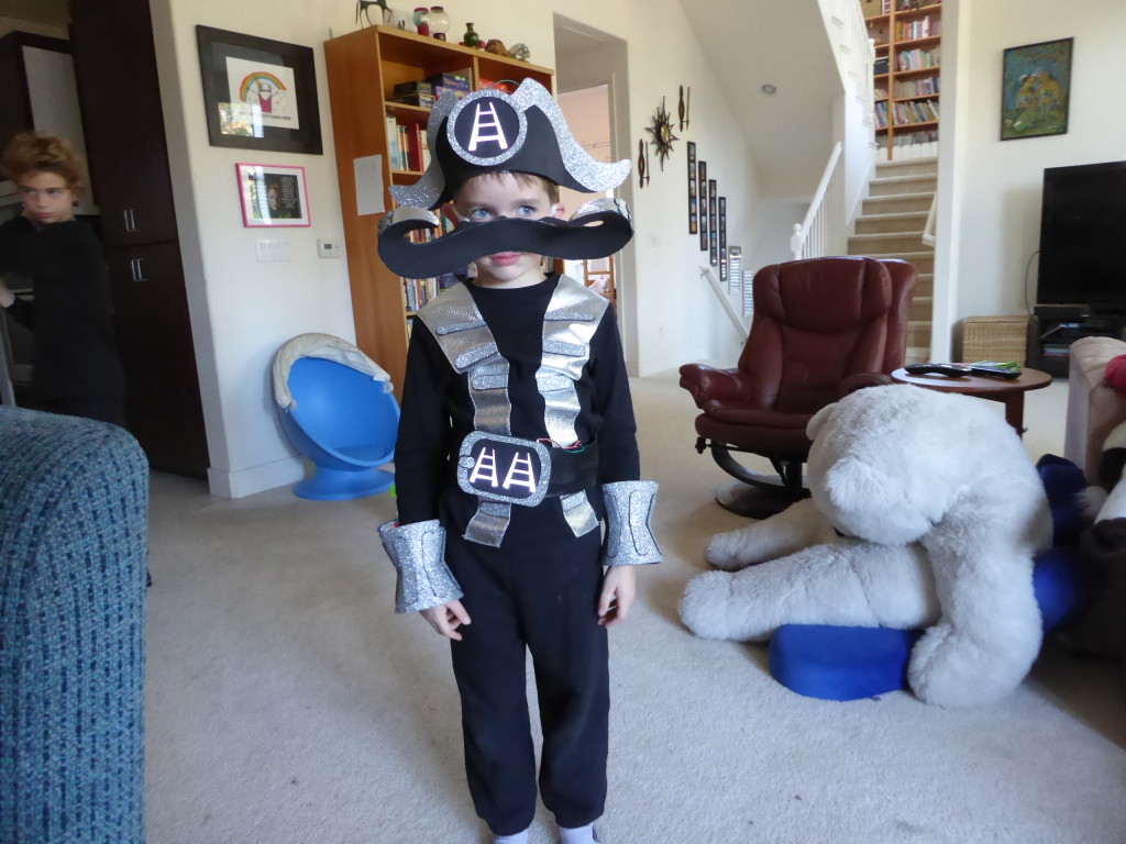 Sam is Skylanders Wash Buckler. His insignia lights up.